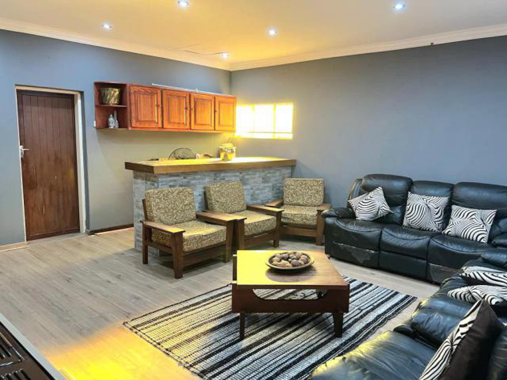 Lounges of property in Waterkloof Ridge
