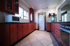 Kitchen - 21 square meters of property in Woodhill Golf Estate