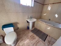 Main Bathroom of property in Mohlakeng