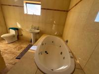 Main Bathroom of property in Mohlakeng