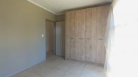 Bed Room 1 - 15 square meters of property in Rooihuiskraal North