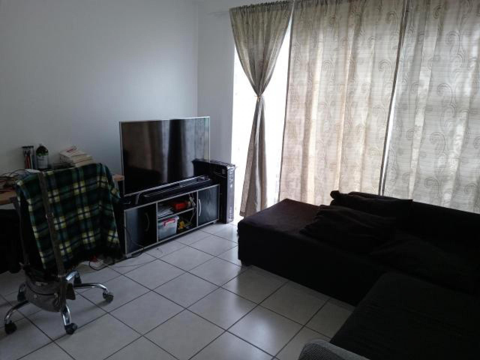 Informal Lounge of property in Muizenberg  