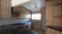 Kitchen - 11 square meters of property in Die Hoewes