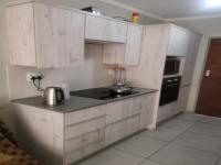 Kitchen of property in Rooihuiskraal North