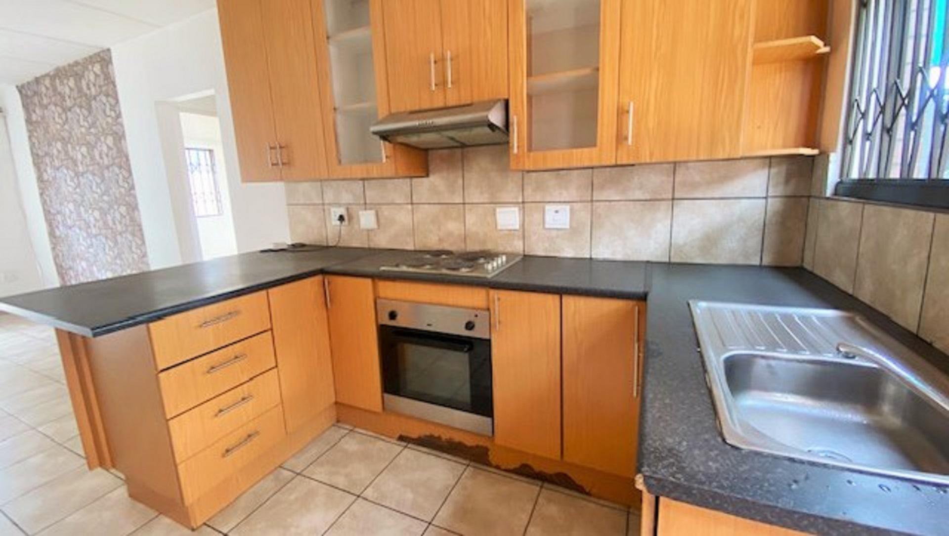 Kitchen of property in Anzac