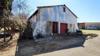 Backyard of property in Homestead Apple Orchards AH