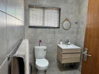 Main Bathroom of property in Langenhoven Park