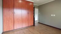 Bed Room 1 - 14 square meters of property in Rooihuiskraal North