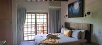 Bed Room 5+ of property in Marloth Park