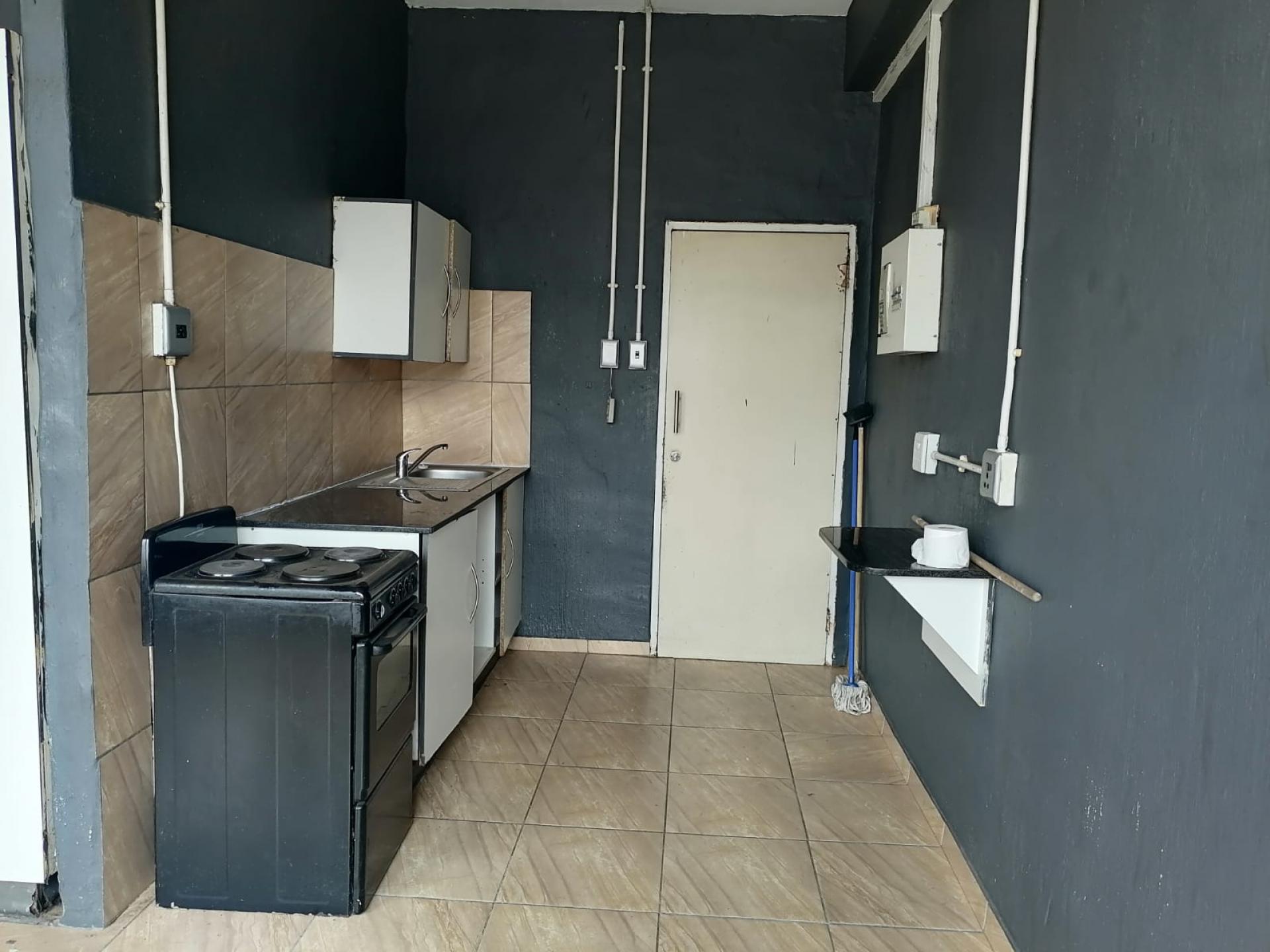 Kitchen of property in Johannesburg Central